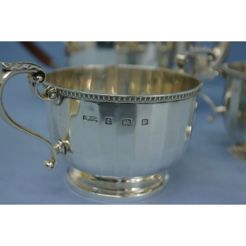 47 - Art Deco four piece silver fluted tea service with gadrooned border and shell decoration. Birmingham... 