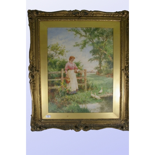 63 - Early 20thC English school H.G., Girl with a jug by a duck pond, Watercolour, Signed and dated 1904,... 