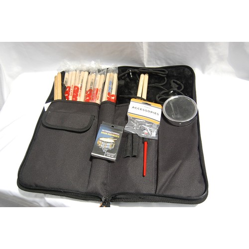 202 - Percussionists stick bag, containing numerous pairs of drums sticks mostly Tama, tuning key etc