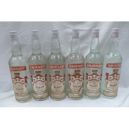 14 - Six bottles of Smirnoff Vodka (3 bottles with ullage)