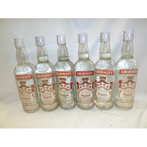 23 - Six 75 cl bottles of Smirnoff Vodka (little ullage)