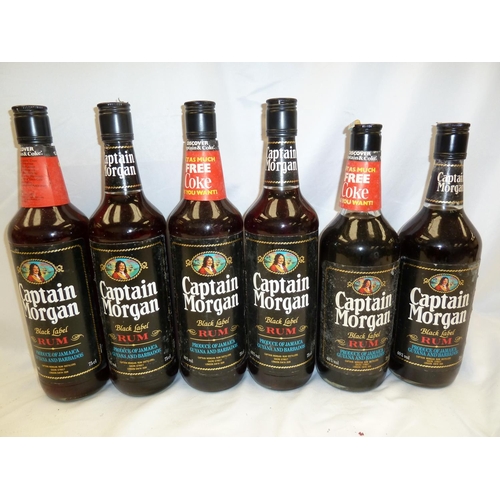 31 - Six 75 cl bottles of Captain Morgan Black Label Rum