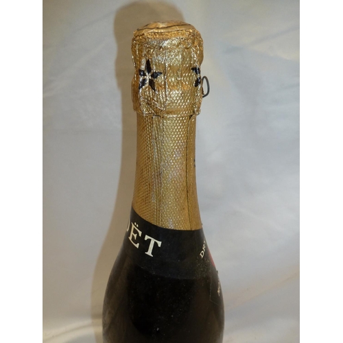 34 - A bottle of 1955 Vintage Moet & Chandon Champagne