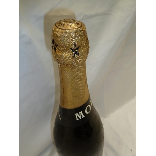 34 - A bottle of 1955 Vintage Moet & Chandon Champagne