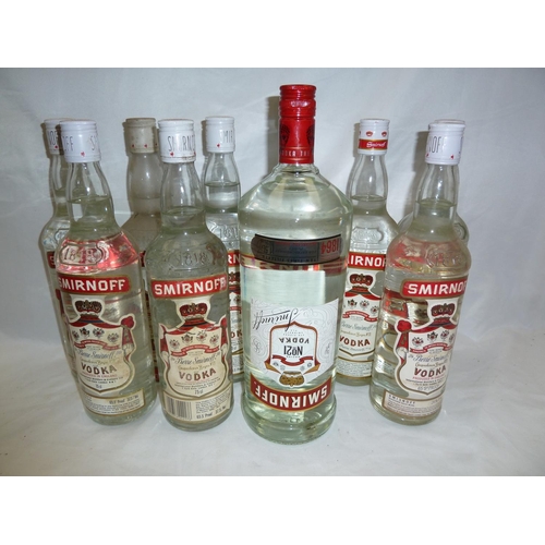 63 - Nine bottles and a 1.5 litre bottle of smirnoff vodka (little ullage)