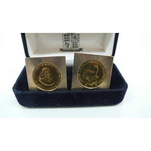 337 - A pair of 1 Rand South Africa gold coins in cuff links, 9ct gold mounts, weight 23.2 grammes in Roya... 