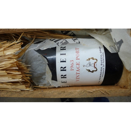 340 - A case of twelve bottles of Ferreira 1963 vintage port (some leakage)