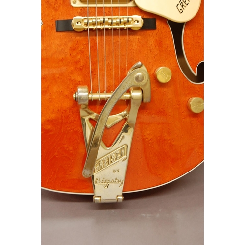 159 - In wonderful condition Gretsch model 6120 orange stain six string electric hollow body guitar, with ... 