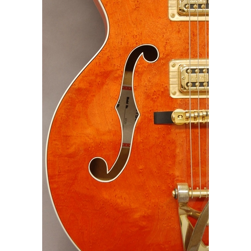 159 - In wonderful condition Gretsch model 6120 orange stain six string electric hollow body guitar, with ... 