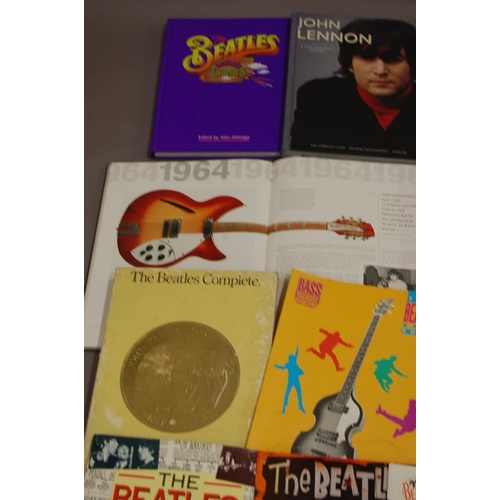 174 - Good collection of The Beatles books, memorabilia etc