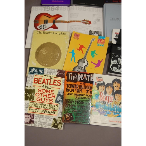 174 - Good collection of The Beatles books, memorabilia etc