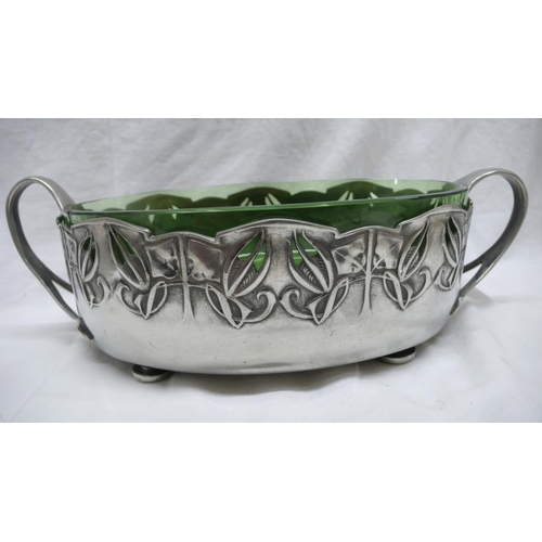 42 - Archibald Knox for Liberty & Co. Tudric Pewter Oval planter with two loop handles, pierced foliate d... 