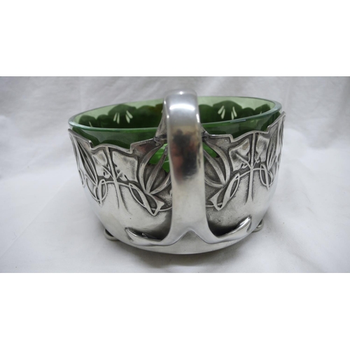 42 - Archibald Knox for Liberty & Co. Tudric Pewter Oval planter with two loop handles, pierced foliate d... 