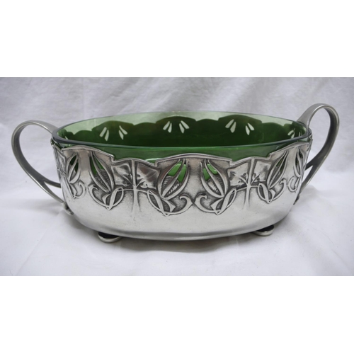 42 - Archibald Knox for Liberty & Co. Tudric Pewter Oval planter with two loop handles, pierced foliate d... 