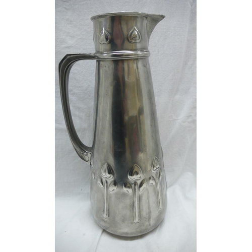 47 - Liberty & Co. Tudric Pewter large jug with stylized tulip decoration, No. 051, Ht. 34.5 cms