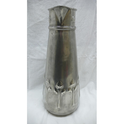 47 - Liberty & Co. Tudric Pewter large jug with stylized tulip decoration, No. 051, Ht. 34.5 cms