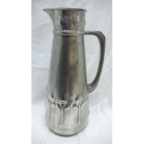 47 - Liberty & Co. Tudric Pewter large jug with stylized tulip decoration, No. 051, Ht. 34.5 cms