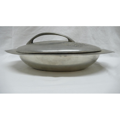 7 - Archibald Knox for Liberty & Co. Tudric Pewter oval entree dish with cover with entwined stem and le... 