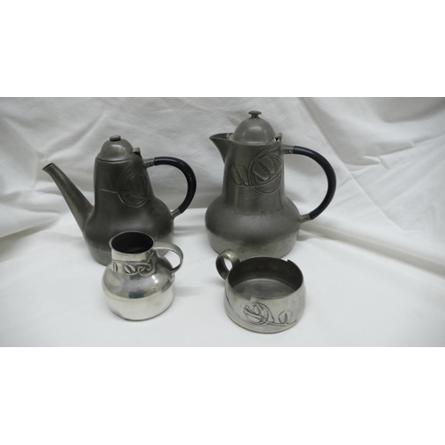 49 - Archibald Knox for Liberty & Co - Tudric Pewter four piece coffee service with stylized leaf decorat... 