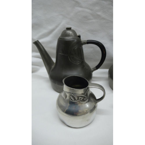 49 - Archibald Knox for Liberty & Co - Tudric Pewter four piece coffee service with stylized leaf decorat... 