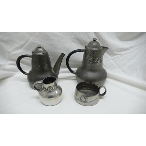 49 - Archibald Knox for Liberty & Co - Tudric Pewter four piece coffee service with stylized leaf decorat... 