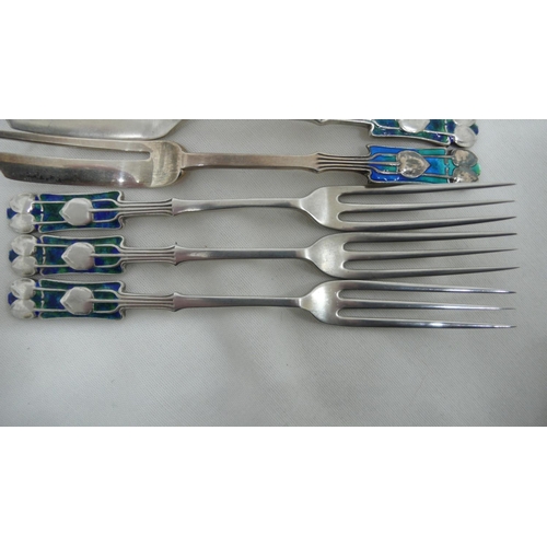 57 - Archibald Knox for Liberty & Co - seven silver and blue green enamel, pastry and fruit forks with Me... 