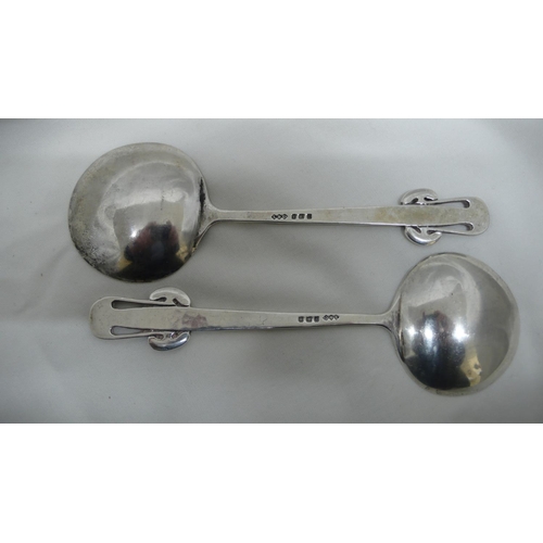 58 - Archibald Knox for Liberty & Co - pair of silver serving spoons with mushroom decoration to tops, Bi... 