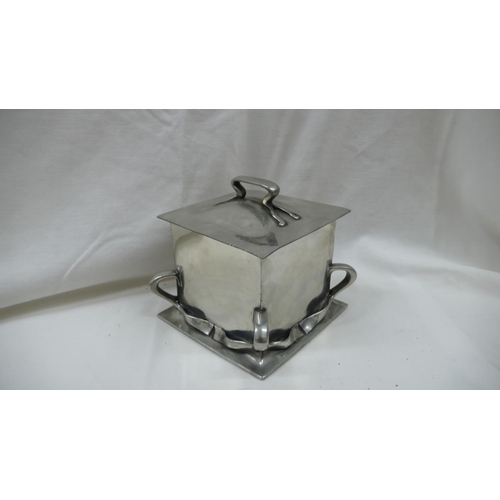 87 - Liberty & Co - Tudric Pewter square shaped biscuit box with handle to top and ribbon decoration to s... 