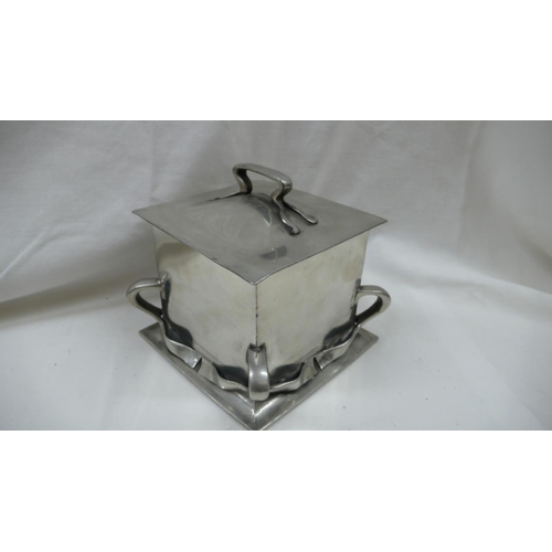 87 - Liberty & Co - Tudric Pewter square shaped biscuit box with handle to top and ribbon decoration to s... 