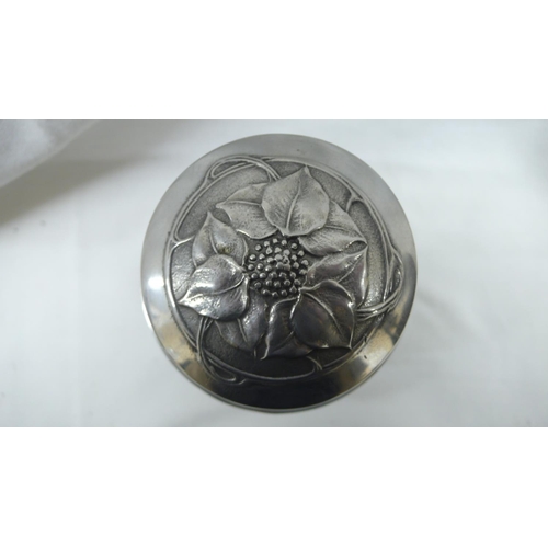 89 - David Veazey for Liberty & Co - Tudric Pewter preserve pot with green glass liner and rose, leaf and... 