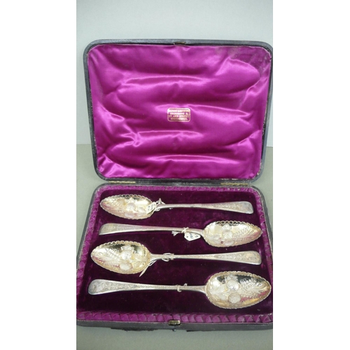 34 - A set of four GIII silver Berry serving spoons cased - 7 ozt