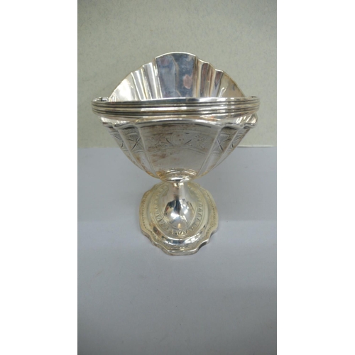 87 - GIII Irish Silver oval fluted swing handled sugar basket with  engraved scroll decoration to border ... 