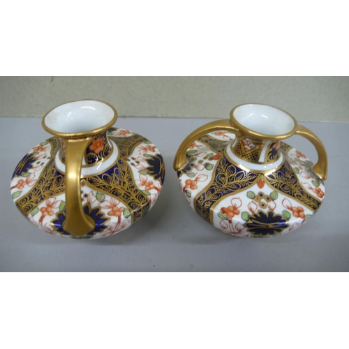 104 - Pair of Royal Crown Derby Imari pattern two handled Urns 1914 - Ht. 3 ins