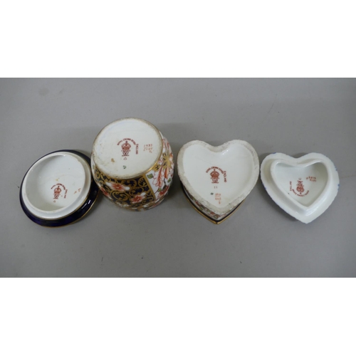 107 - Two Royal Crown Derby boxes with covers in the Imari pattern.  Heart shaped 1939, Drum 1917 - talles... 