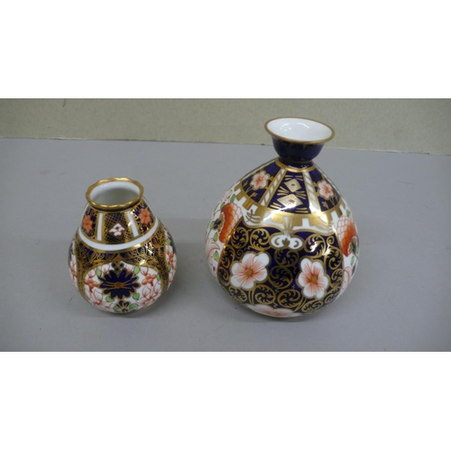 108 - Two Royal Crown Derby vases in the Imari pattern - tallest 4 ins - 1909 & 1924