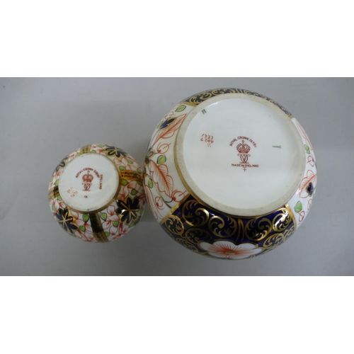 108 - Two Royal Crown Derby vases in the Imari pattern - tallest 4 ins - 1909 & 1924