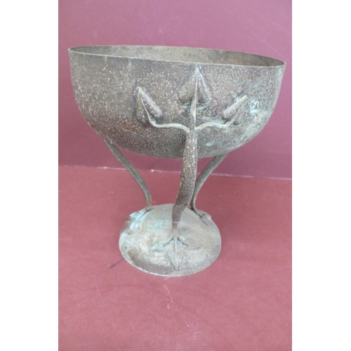 141 - Art Nouveau hammered metal tazza on curved legs with leaf decoration to top and bottom on raised cir... 