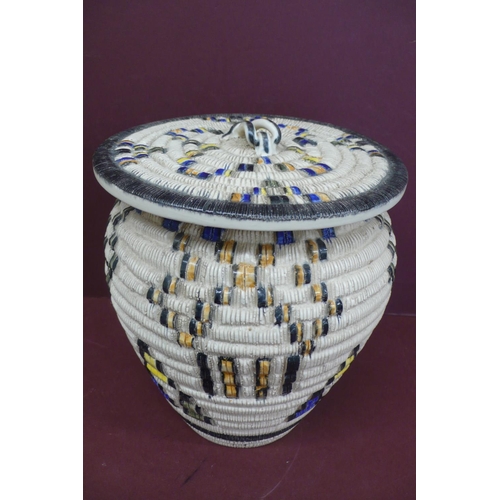 144 - Gorbon Senat pottery jar with cover in the form of a basket - ht. 9 ins