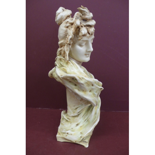 146 - Art Nouveau porcelain head and shoulders of a girl with a bun and green scarf signed E. Stellura ? -... 