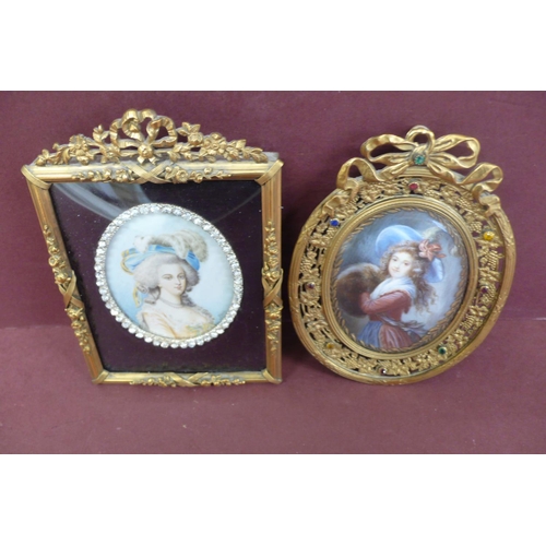 148 - Two oval miniatures of beauties in jewelled brass frames - ht. 5.75 ins