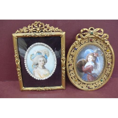 148 - Two oval miniatures of beauties in jewelled brass frames - ht. 5.75 ins