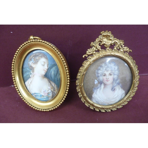 148 - Two oval miniatures of beauties in jewelled brass frames - ht. 5.75 ins