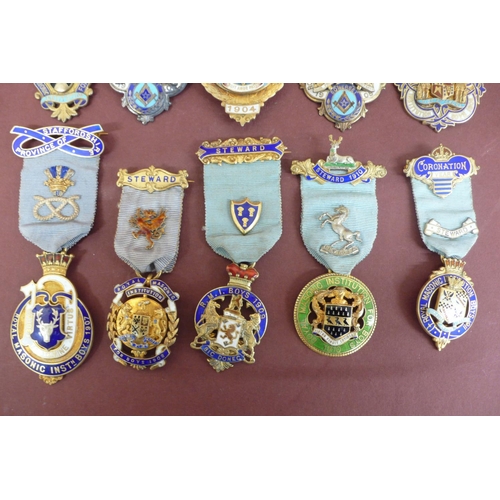 175 - Ten silver gilt enamel jewels by Spencer London for the Royal Masonic Institution for boys mostly St... 