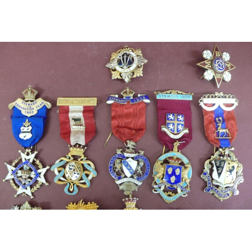 177 - Eighteen silver gilt enamel jewels mostly by Spencer of London for the Royal Masonic Benovelent Inst... 