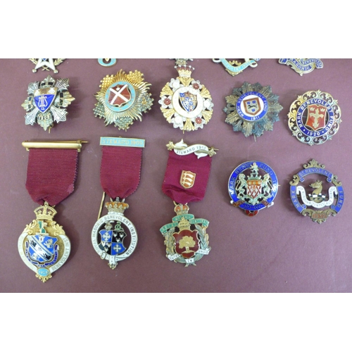 177 - Eighteen silver gilt enamel jewels mostly by Spencer of London for the Royal Masonic Benovelent Inst... 