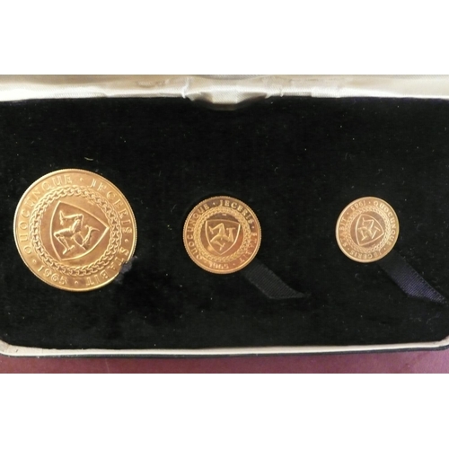 181 - 1965 Isle of Man gold three coin set - cased £5, Sovereign and half sovereign