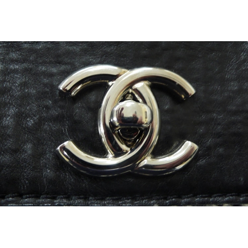 196 - Chanel black leather tweedy flap bag - having plaited material and chrome link handle, chrome fittin... 