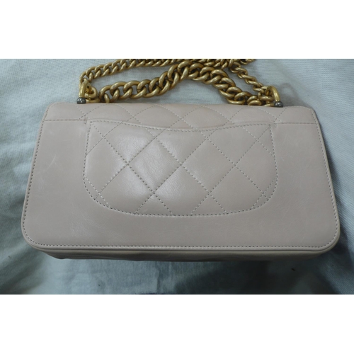 198 - Chanel straight line flap bag, quilted pale pink leather with gold plated long and short handles, go... 