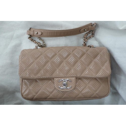 199 - Chanel flap bag quilted pink leather with perforated decoration, leather and chrome link handle, chr... 