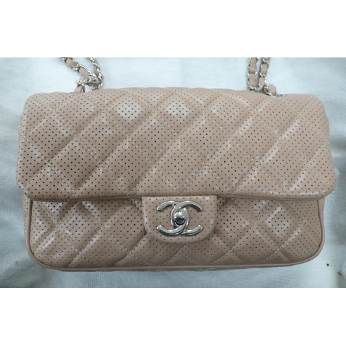 199 - Chanel flap bag quilted pink leather with perforated decoration, leather and chrome link handle, chr... 